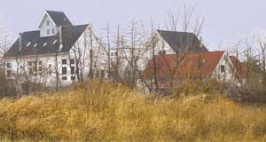 The Farmstead (pictured) was the first completed settlement at Tryon Farms in Michigan City, Indiana. Other settlements include The Pasture, The Dune, The Village, The Meadow, The Woods and The Pond.